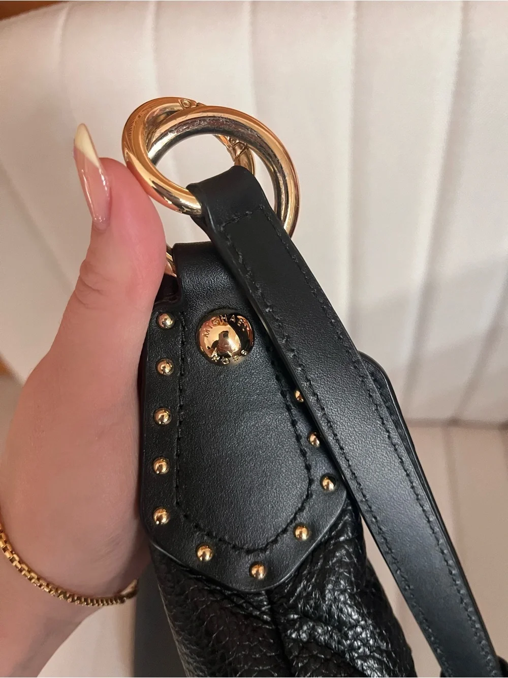 Michael Kors Black Leather Shoulder Bag with Gold Hardware and Stud Accents